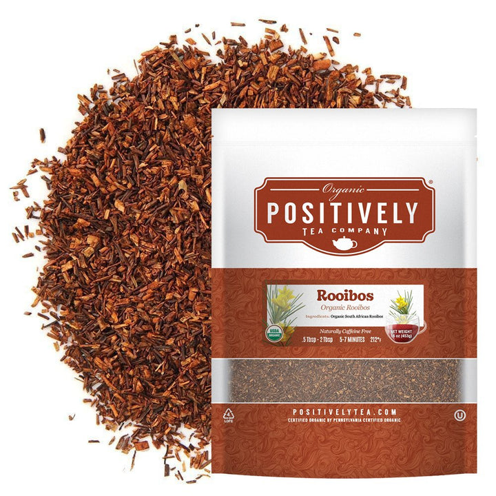 Positively Tea Company Organic Rooibos tea, 16oz bag, displayed with loose leaf tea highlighting its smooth, naturally caffeine-free flavor.